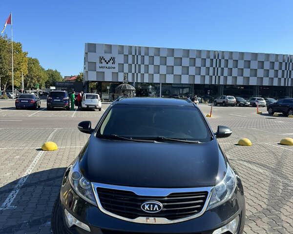 Черный Киа Sportage, объемом двигателя 2 л и пробегом 225 тыс. км за 13750 $, фото 6 на Automoto.ua