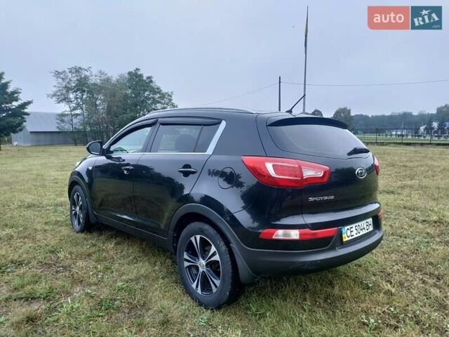 Чорний Кіа Sportage, об'ємом двигуна 2 л та пробігом 150 тис. км за 11500 $, фото 4 на Automoto.ua