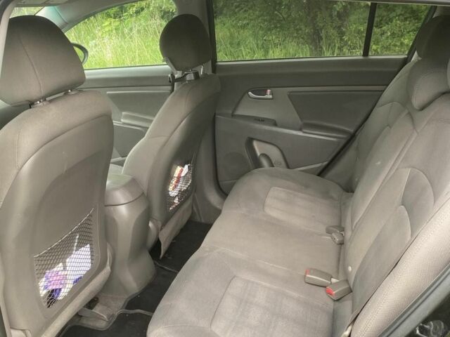 Чорний Кіа Sportage, об'ємом двигуна 2.4 л та пробігом 165 тис. км за 10000 $, фото 7 на Automoto.ua