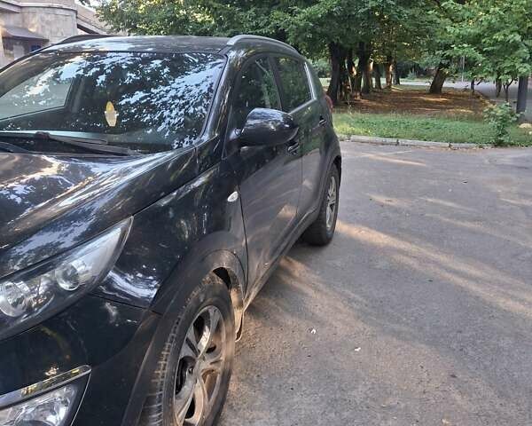 Черный Киа Sportage, объемом двигателя 1.69 л и пробегом 245 тыс. км за 10700 $, фото 2 на Automoto.ua
