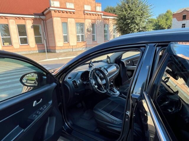 Чорний Кіа Sportage, об'ємом двигуна 2 л та пробігом 184 тис. км за 12100 $, фото 8 на Automoto.ua
