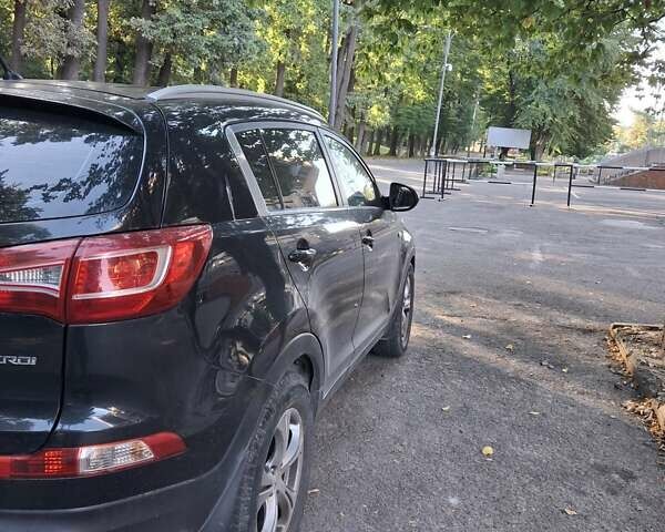 Черный Киа Sportage, объемом двигателя 1.69 л и пробегом 245 тыс. км за 10700 $, фото 4 на Automoto.ua