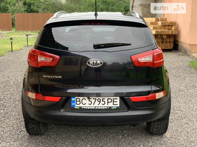 Черный Киа Sportage, объемом двигателя 2 л и пробегом 203 тыс. км за 11900 $, фото 4 на Automoto.ua