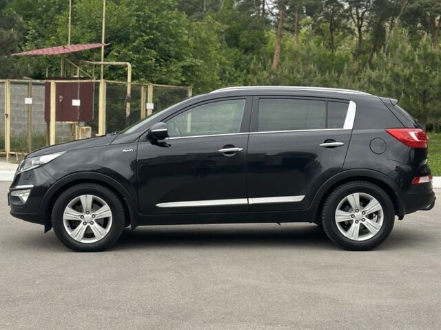 Чорний Кіа Sportage, об'ємом двигуна 2 л та пробігом 218 тис. км за 12799 $, фото 3 на Automoto.ua