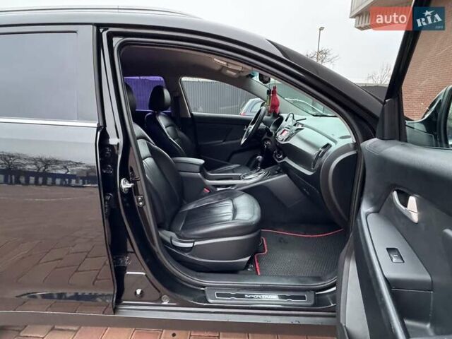 Черный Киа Sportage, объемом двигателя 2 л и пробегом 180 тыс. км за 13300 $, фото 52 на Automoto.ua