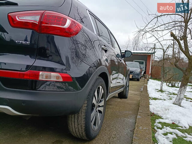 Черный Киа Sportage, объемом двигателя 2 л и пробегом 209 тыс. км за 14599 $, фото 1 на Automoto.ua