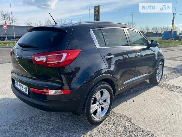 Чорний Кіа Sportage, об'ємом двигуна 2 л та пробігом 194 тис. км за 12690 $, фото 5 на Automoto.ua