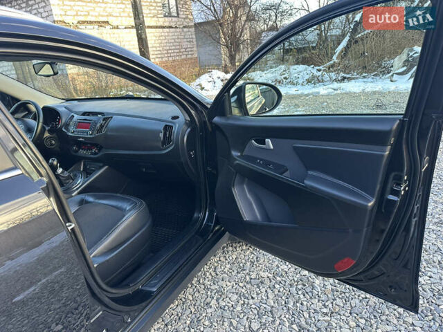Черный Киа Sportage, объемом двигателя 1.7 л и пробегом 206 тыс. км за 12100 $, фото 30 на Automoto.ua