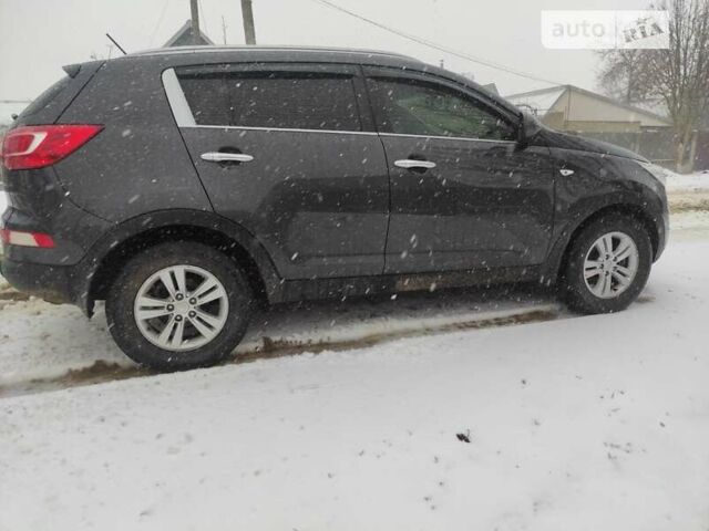 Чорний Кіа Sportage, об'ємом двигуна 2 л та пробігом 195 тис. км за 11200 $, фото 5 на Automoto.ua