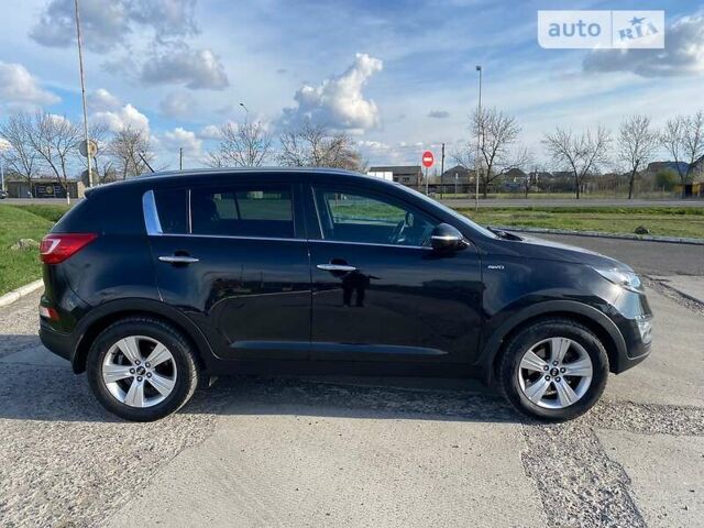 Чорний Кіа Sportage, об'ємом двигуна 2 л та пробігом 194 тис. км за 12690 $, фото 7 на Automoto.ua