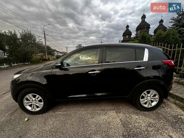 Черный Киа Sportage, объемом двигателя 1.7 л и пробегом 214 тыс. км за 12000 $, фото 1 на Automoto.ua