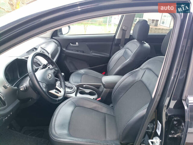 Черный Киа Sportage, объемом двигателя 2 л и пробегом 209 тыс. км за 14599 $, фото 29 на Automoto.ua