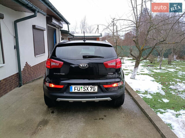 Черный Киа Sportage, объемом двигателя 2 л и пробегом 209 тыс. км за 14599 $, фото 24 на Automoto.ua