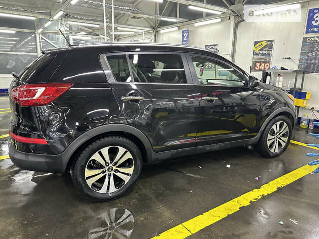 Чорний Кіа Sportage, об'ємом двигуна 2.4 л та пробігом 329 тис. км за 11890 $, фото 11 на Automoto.ua