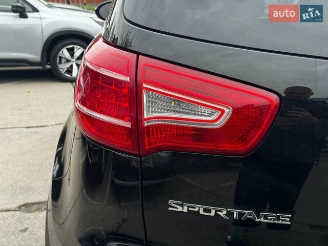Черный Киа Sportage, объемом двигателя 2.4 л и пробегом 173 тыс. км за 12990 $, фото 23 на Automoto.ua