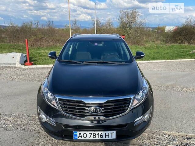 Чорний Кіа Sportage, об'ємом двигуна 2 л та пробігом 194 тис. км за 12690 $, фото 1 на Automoto.ua