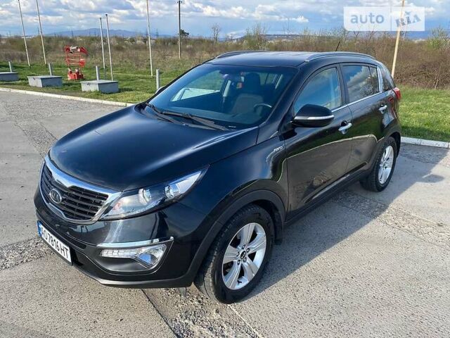 Чорний Кіа Sportage, об'ємом двигуна 2 л та пробігом 194 тис. км за 12690 $, фото 6 на Automoto.ua