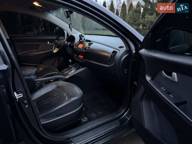 Черный Киа Sportage, объемом двигателя 2 л и пробегом 198 тыс. км за 12700 $, фото 28 на Automoto.ua