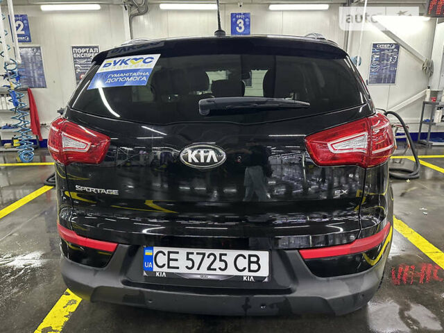 Чорний Кіа Sportage, об'ємом двигуна 2.4 л та пробігом 329 тис. км за 11890 $, фото 8 на Automoto.ua