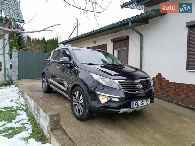 Черный Киа Sportage, объемом двигателя 2 л и пробегом 209 тыс. км за 14599 $, фото 26 на Automoto.ua