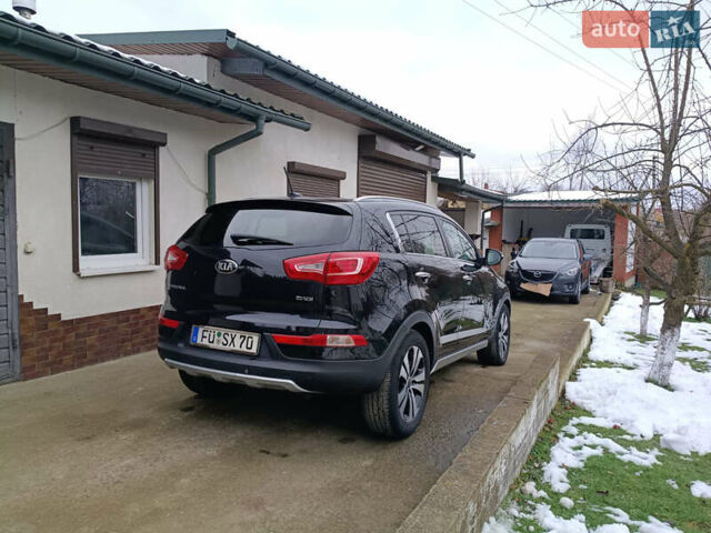 Черный Киа Sportage, объемом двигателя 2 л и пробегом 209 тыс. км за 14599 $, фото 28 на Automoto.ua