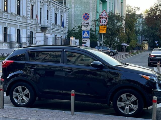 Чорний Кіа Sportage, об'ємом двигуна 2.4 л та пробігом 180 тис. км за 12000 $, фото 7 на Automoto.ua