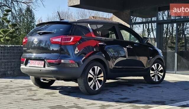Черный Киа Sportage, объемом двигателя 2 л и пробегом 244 тыс. км за 13200 $, фото 23 на Automoto.ua