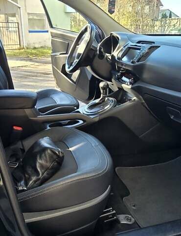 Черный Киа Sportage, объемом двигателя 2 л и пробегом 244 тыс. км за 13200 $, фото 12 на Automoto.ua