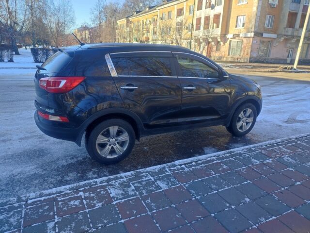 Черный Киа Sportage, объемом двигателя 2 л и пробегом 72 тыс. км за 11400 $, фото 7 на Automoto.ua