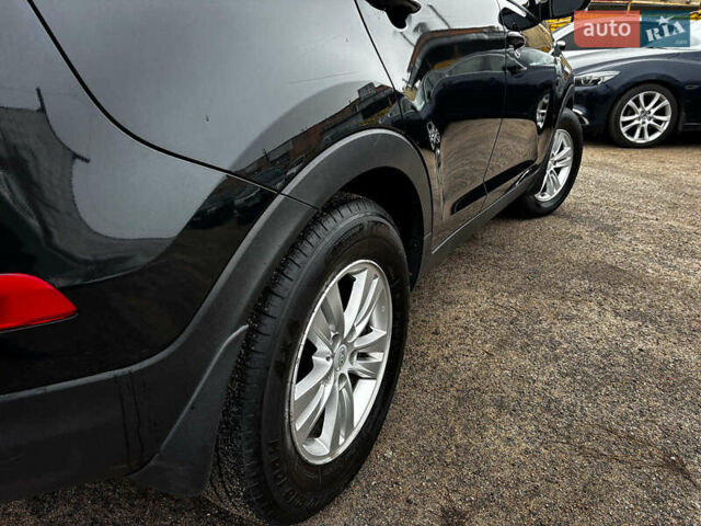 Черный Киа Sportage, объемом двигателя 1.7 л и пробегом 165 тыс. км за 13490 $, фото 10 на Automoto.ua