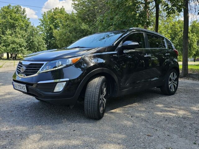 Черный Киа Sportage, объемом двигателя 2.4 л и пробегом 172 тыс. км за 12500 $, фото 1 на Automoto.ua