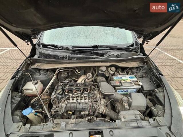 Чорний Кіа Sportage, об'ємом двигуна 1.69 л та пробігом 144 тис. км за 11200 $, фото 14 на Automoto.ua