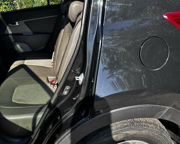 Черный Киа Sportage, объемом двигателя 1.7 л и пробегом 214 тыс. км за 12000 $, фото 14 на Automoto.ua