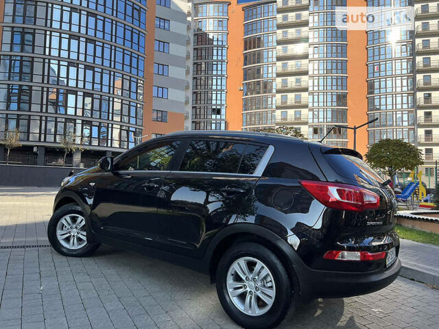 Чорний Кіа Sportage, об'ємом двигуна 2 л та пробігом 135 тис. км за 12450 $, фото 38 на Automoto.ua