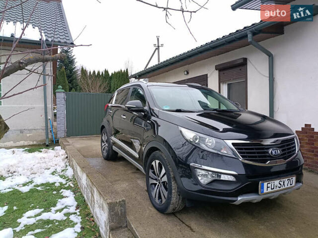 Черный Киа Sportage, объемом двигателя 2 л и пробегом 209 тыс. км за 14599 $, фото 27 на Automoto.ua