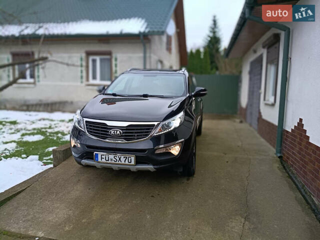 Черный Киа Sportage, объемом двигателя 2 л и пробегом 209 тыс. км за 14599 $, фото 23 на Automoto.ua