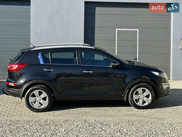 Черный Киа Sportage, объемом двигателя 1.7 л и пробегом 206 тыс. км за 12100 $, фото 14 на Automoto.ua
