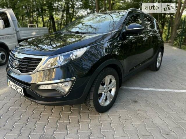 Черный Киа Sportage, объемом двигателя 2 л и пробегом 207 тыс. км за 11800 $, фото 13 на Automoto.ua