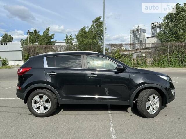 Чорний Кіа Sportage, об'ємом двигуна 2 л та пробігом 341 тис. км за 10600 $, фото 5 на Automoto.ua