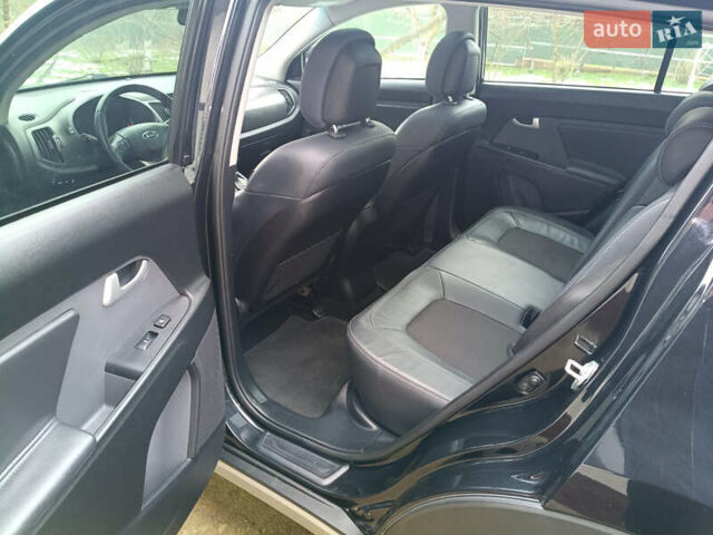 Черный Киа Sportage, объемом двигателя 2 л и пробегом 209 тыс. км за 14599 $, фото 30 на Automoto.ua