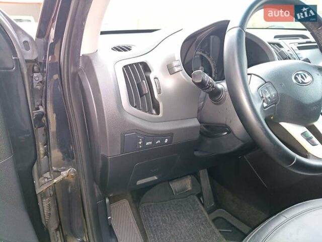 Черный Киа Sportage, объемом двигателя 2 л и пробегом 209 тыс. км за 14599 $, фото 32 на Automoto.ua