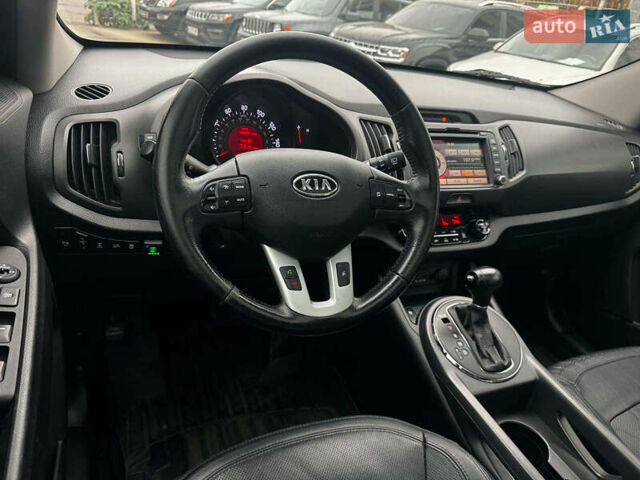 Черный Киа Sportage, объемом двигателя 2.4 л и пробегом 173 тыс. км за 12990 $, фото 25 на Automoto.ua