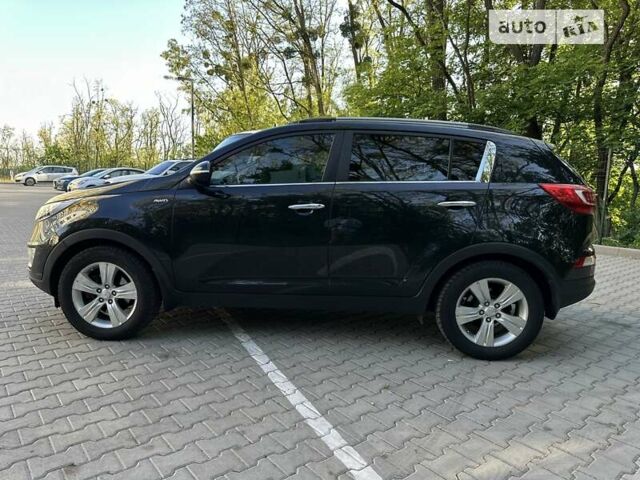 Чорний Кіа Sportage, об'ємом двигуна 2 л та пробігом 207 тис. км за 11800 $, фото 11 на Automoto.ua