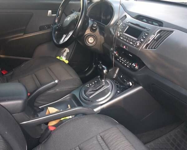 Чорний Кіа Sportage, об'ємом двигуна 2 л та пробігом 133 тис. км за 12700 $, фото 1 на Automoto.ua