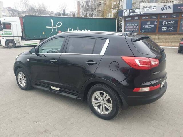 Чорний Кіа Sportage, об'ємом двигуна 1.69 л та пробігом 250 тис. км за 12400 $, фото 13 на Automoto.ua