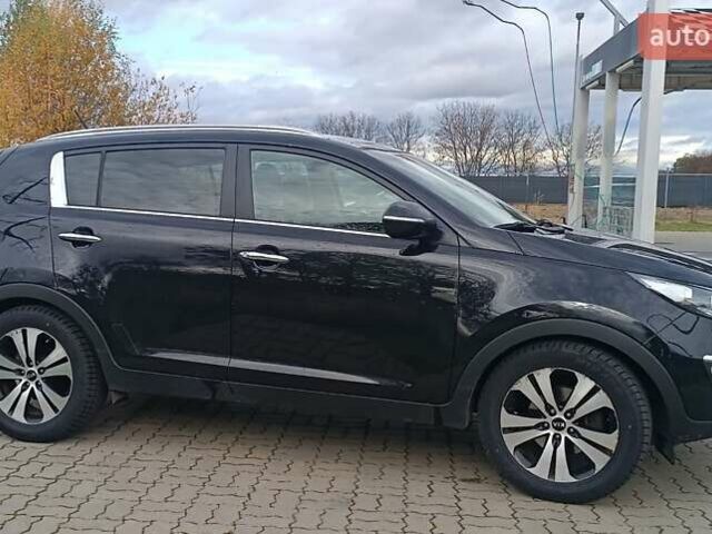 Черный Киа Sportage, объемом двигателя 1.7 л и пробегом 167 тыс. км за 12800 $, фото 2 на Automoto.ua