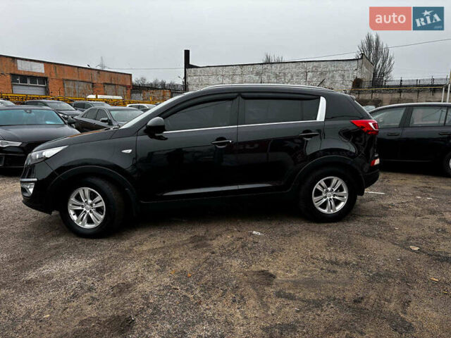 Черный Киа Sportage, объемом двигателя 1.7 л и пробегом 165 тыс. км за 13490 $, фото 1 на Automoto.ua