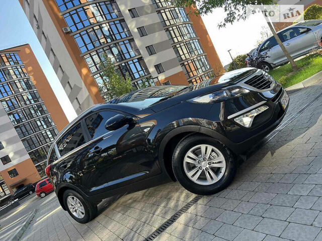 Чорний Кіа Sportage, об'ємом двигуна 2 л та пробігом 135 тис. км за 12450 $, фото 34 на Automoto.ua