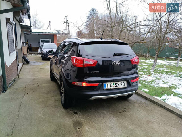 Черный Киа Sportage, объемом двигателя 2 л и пробегом 209 тыс. км за 14599 $, фото 25 на Automoto.ua