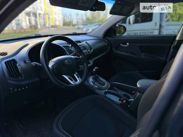 Чорний Кіа Sportage, об'ємом двигуна 2 л та пробігом 207 тис. км за 11800 $, фото 18 на Automoto.ua